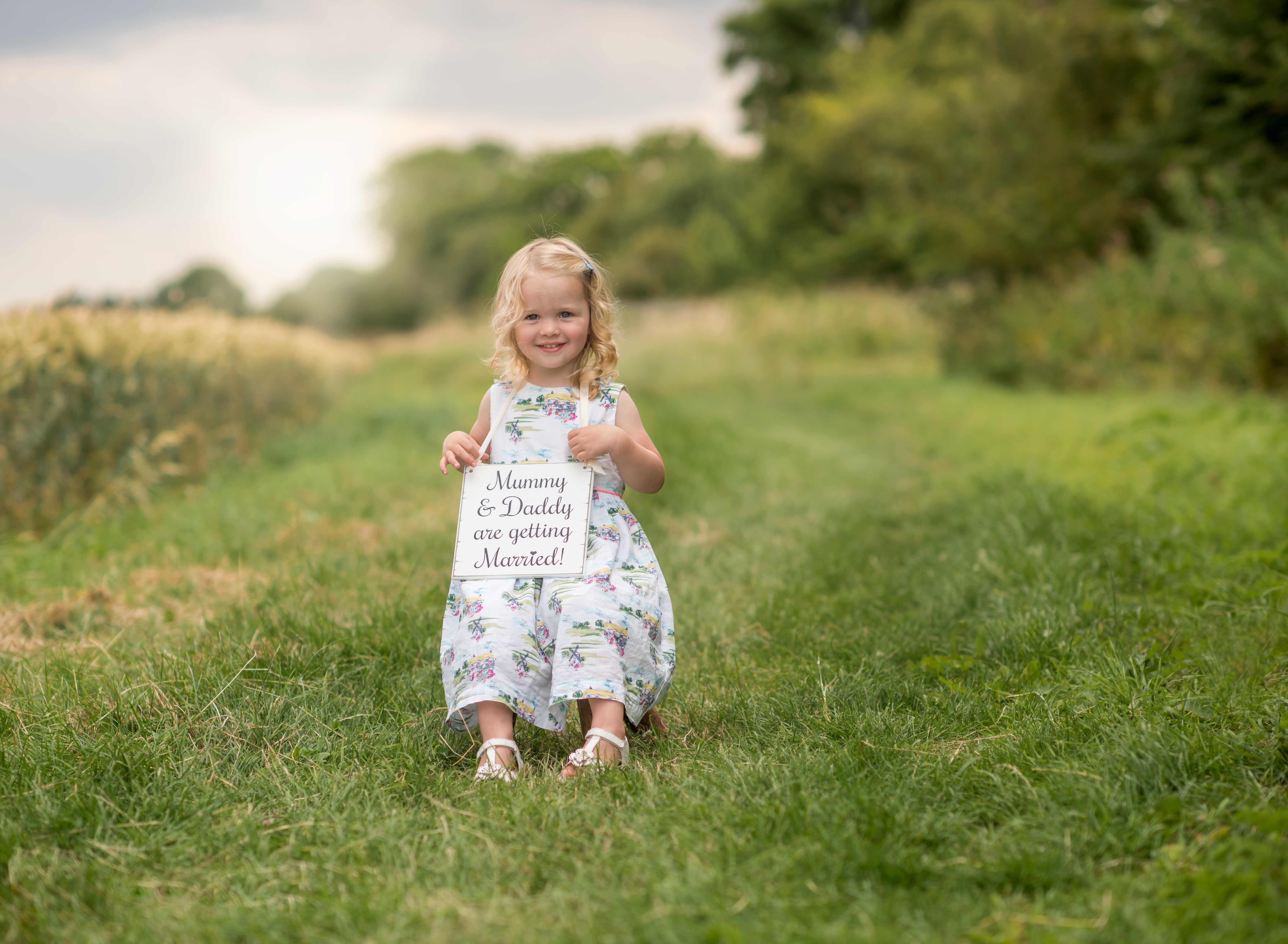 Girl announcing mum and dad are getting married