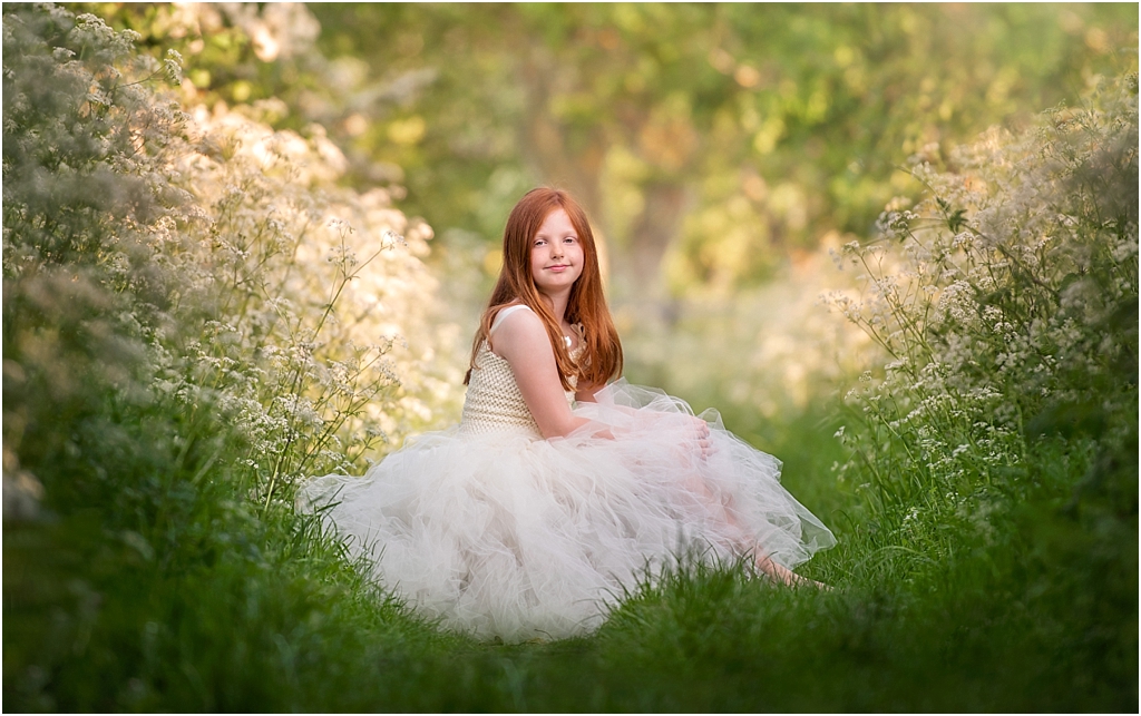 Girl in a pretty dress enjoying a photo shoot