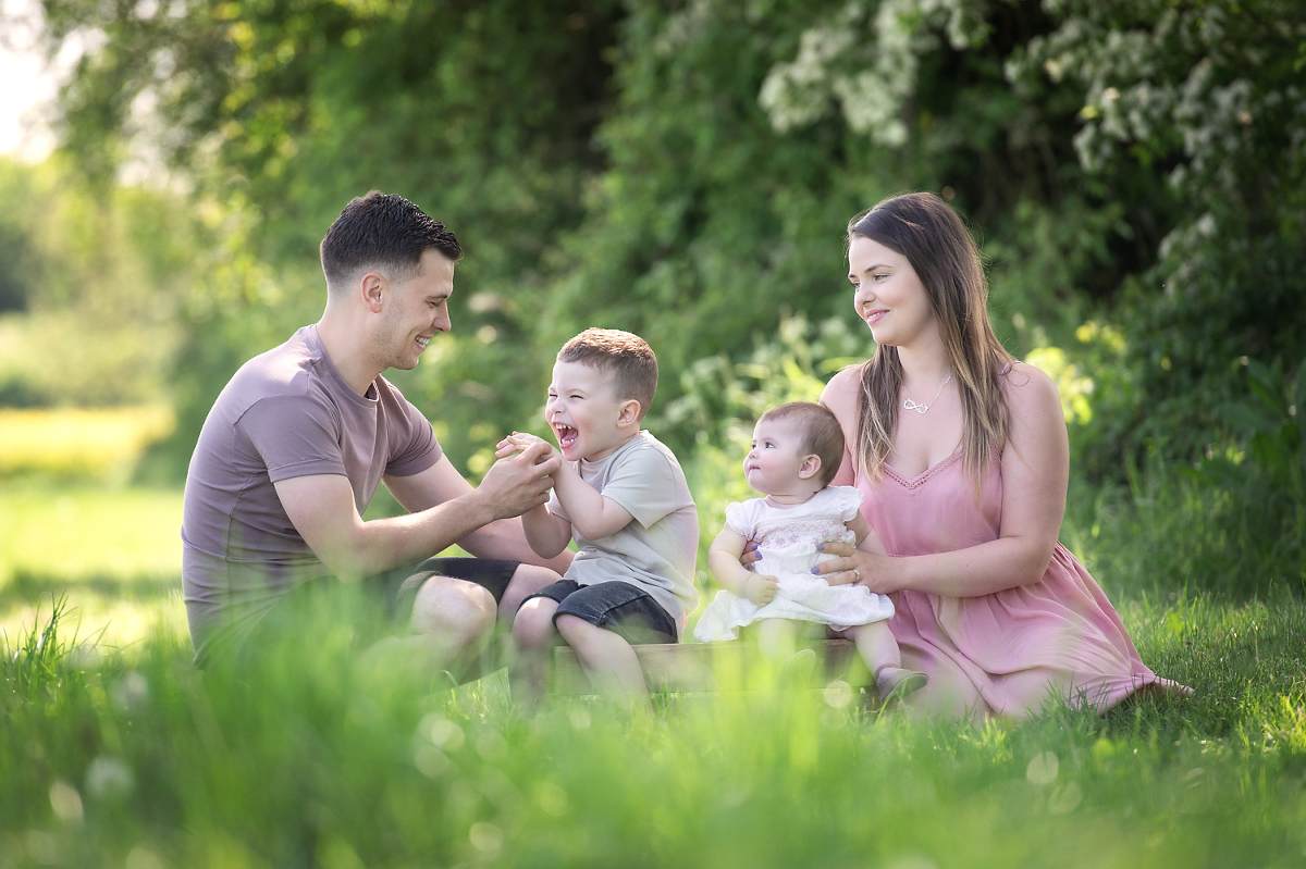 Family enjoying a summer photo shoot