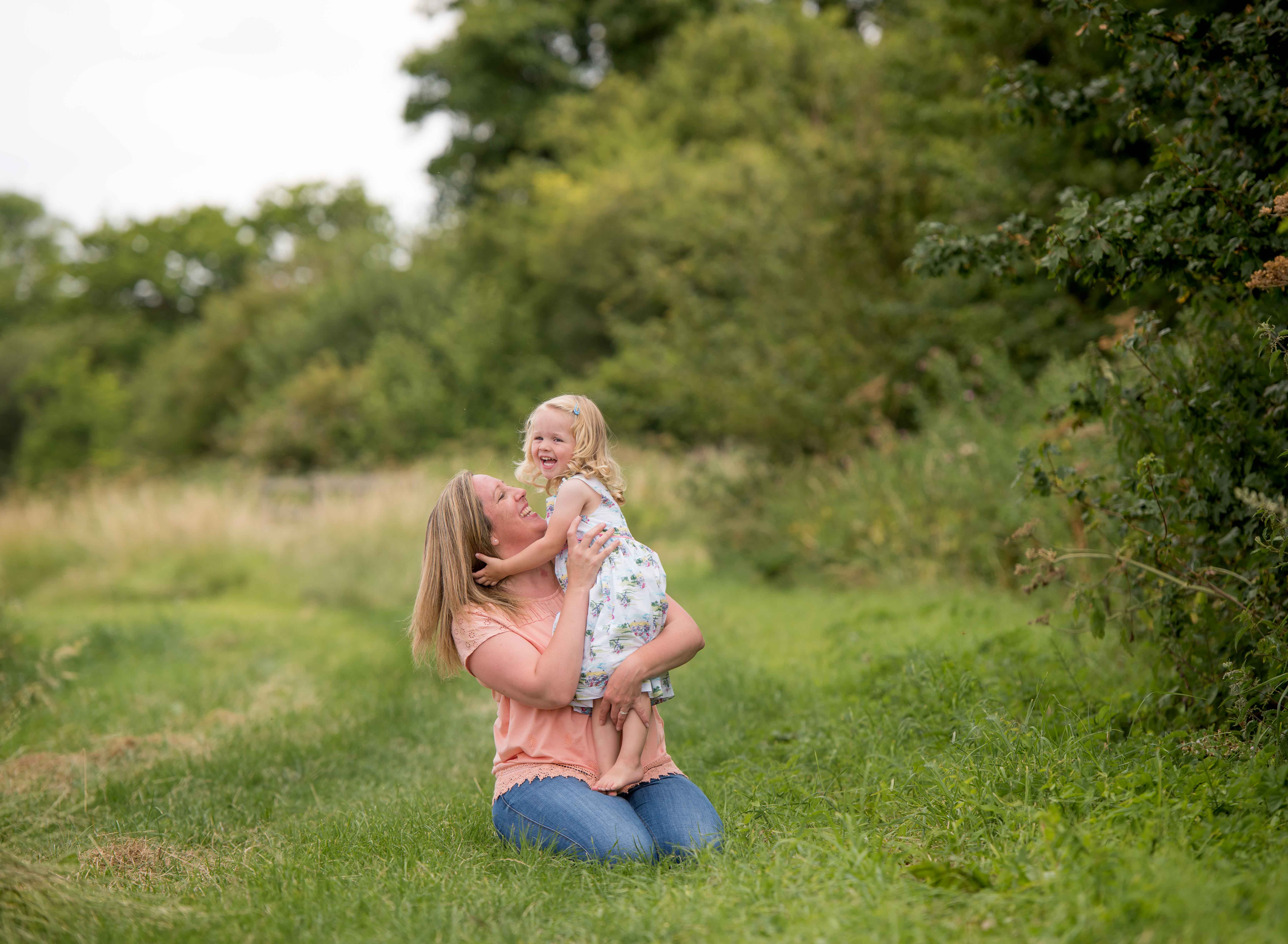 Mum and daughter enjoying a summer photo shoot