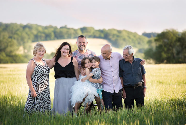 Family photo shoot in a cornfield