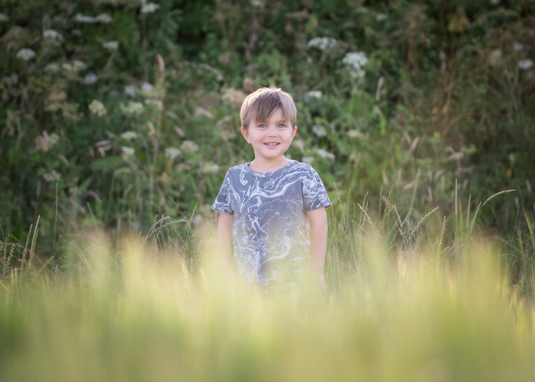 Boy playing in the fields